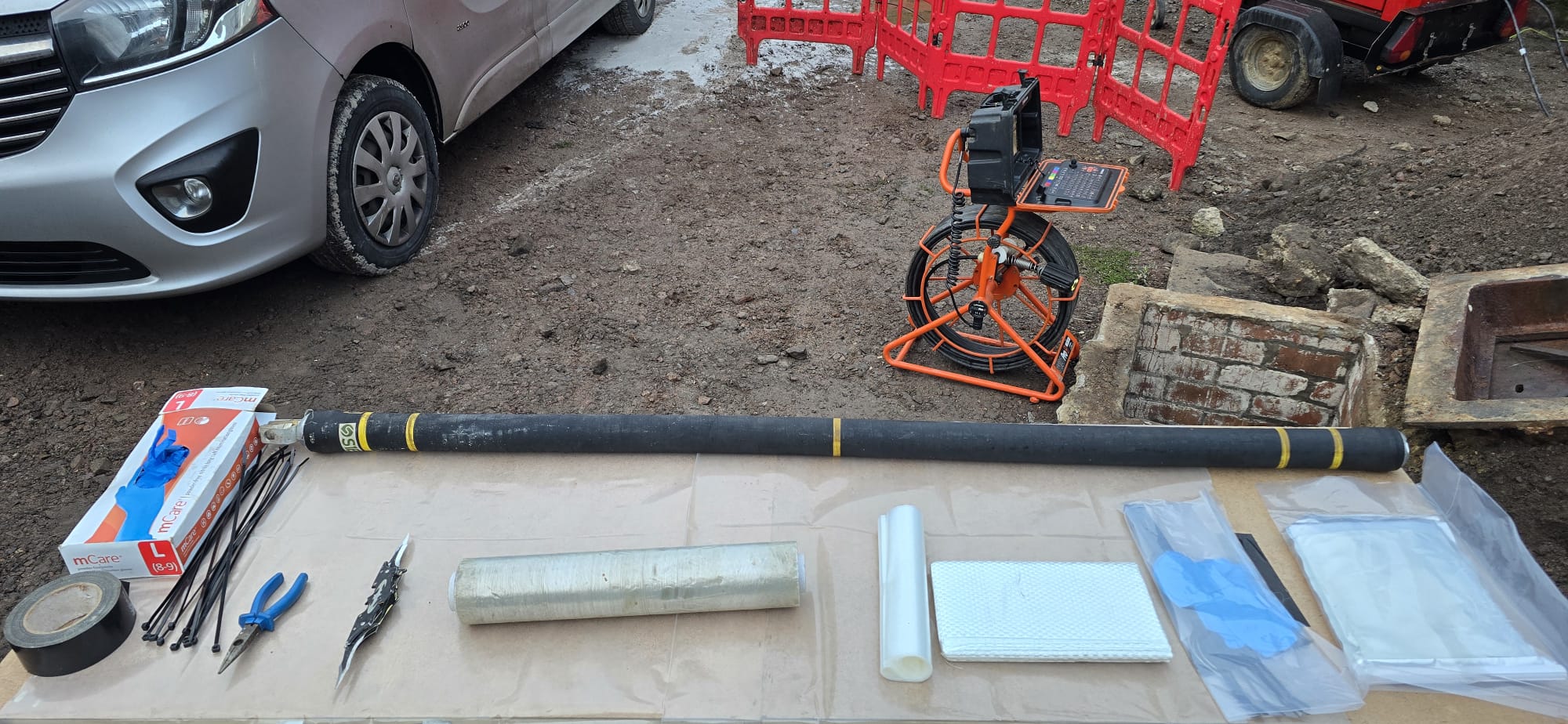 Patch material wrapped around the packer